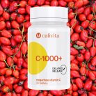Calivita C-1000+ bijela bočica s 30 tableta megadoze vitamina C s delayed release tehnologijom na prirodnoj pozadini svježeg crvenog šipka za jačanje imuniteta