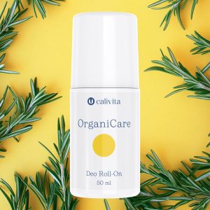 Calivita OrganiCare Deo Roll-On 50ml - prirodni dezodorans na žutoj pozadini s grančicama ružmarina