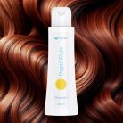 Calivita OrganiCare organski šampon za kosu 200ml bijela bočica na pozadini sjajne smeđe kose